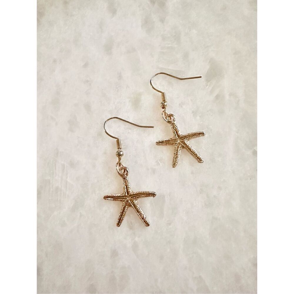 Gold color starfish dangle earrings ￼